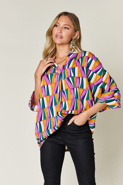 Double Take Full Size Geometric Notched Raglan Sleeve Blouse