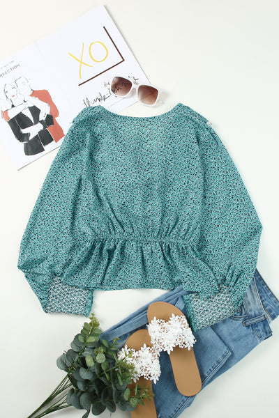 Printed Tassel Tie Peplum Top